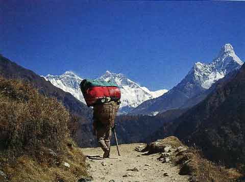 
Porter with Everest, Lhotse and Ama Dablam - Everest North Face - Everest: A Trekkers Guide book
